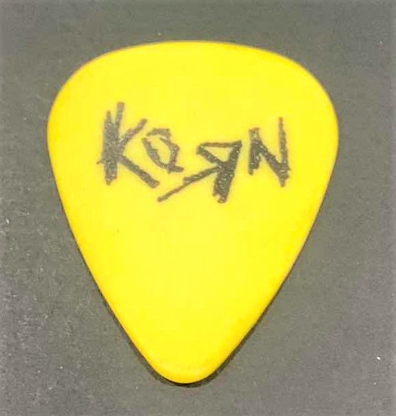 Photo 2 of COLLECTIBLE MEMORABILIA SIGNED GUITAR PICK, KORN LIFE IS PEACHY