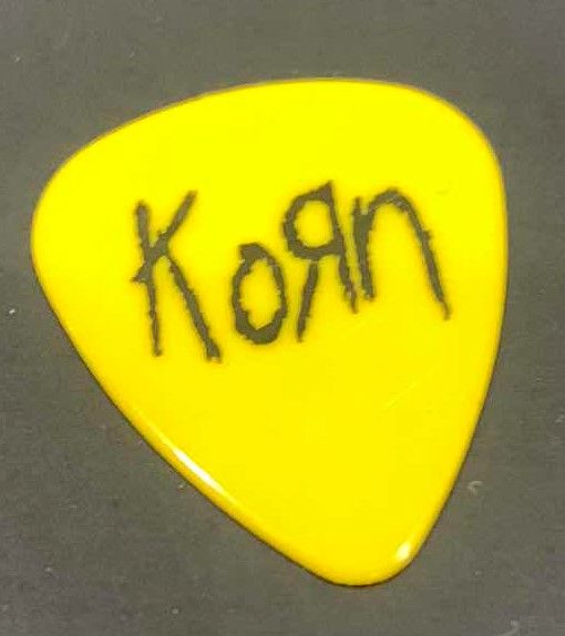 Photo 2 of COLLECTIBLE MEMORABILIA SIGNED GUITAR PICK, KORN LIFE IS PEACHY