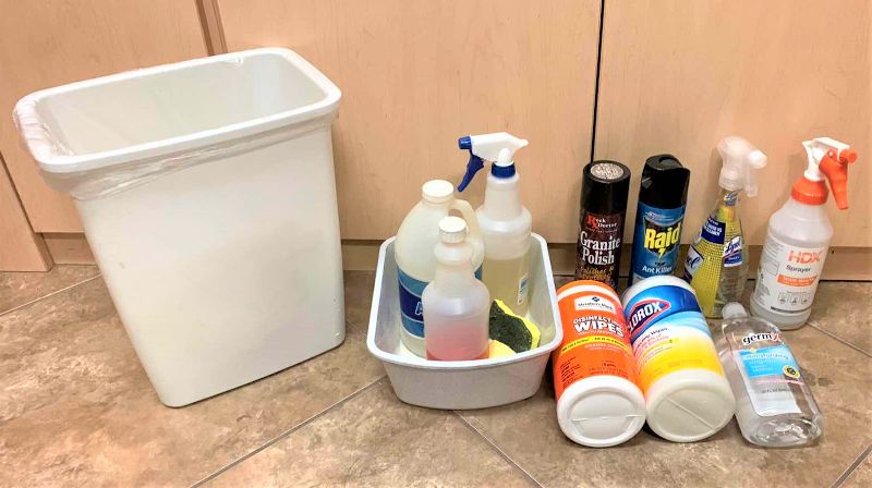 Photo 1 of CLEANING SUPPLIES AND WASTEBASKET