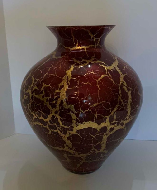 Photo 1 of RED AND GOLD LEAF GLASS VASE, 13” x H15”