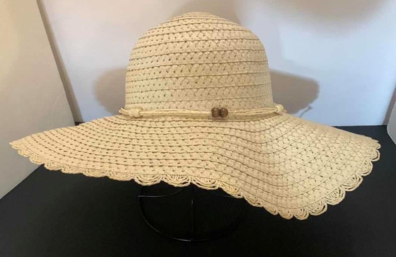 Photo 2 of THREE LADIES STRAW HATS WITH STAND