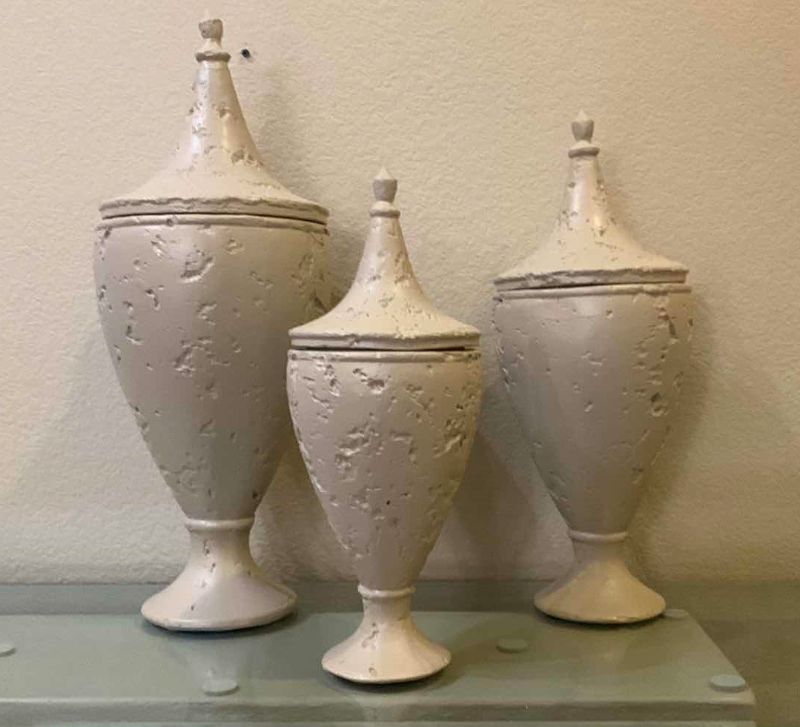 Photo 2 of SET OF 3 OFF WHITE PLASTER URNS W LIDS, TALLEST H23”