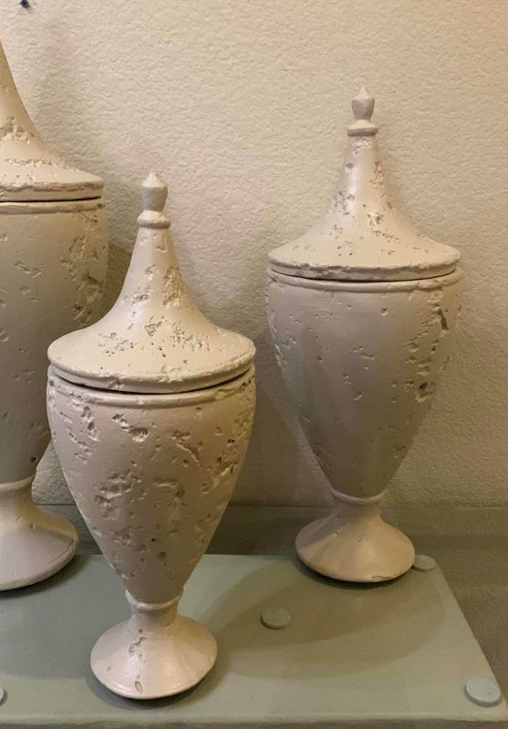 Photo 4 of SET OF 3 OFF WHITE PLASTER URNS W LIDS, TALLEST H23”