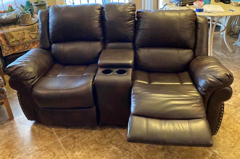 Photo 2 of BONDED LEATHER MANUAL RECLINING LOVESEAT WITH CONSOLE 74” (ONE SEAT RECLINES)