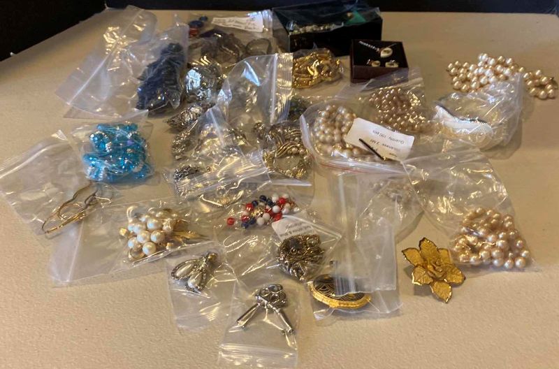 Photo 1 of BOX OF COSTUME JEWELRY