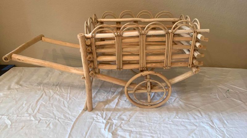 Photo 2 of 5 - PIECE WICKER AND WOOD COLLECTIBLES ( WAGON 29” x H14”)