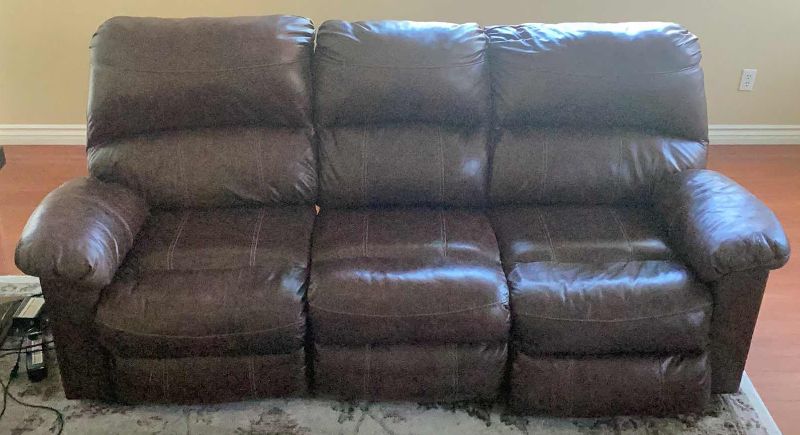 Photo 1 of LEATHER ELECTRIC DOUBLE RECLINER SOFA 88” X 43” H 40”