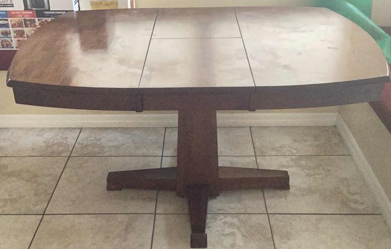 Photo 1 of WOODEN DINING ROOM TABLE WITH EXTENDER 55” X 42” H 30”