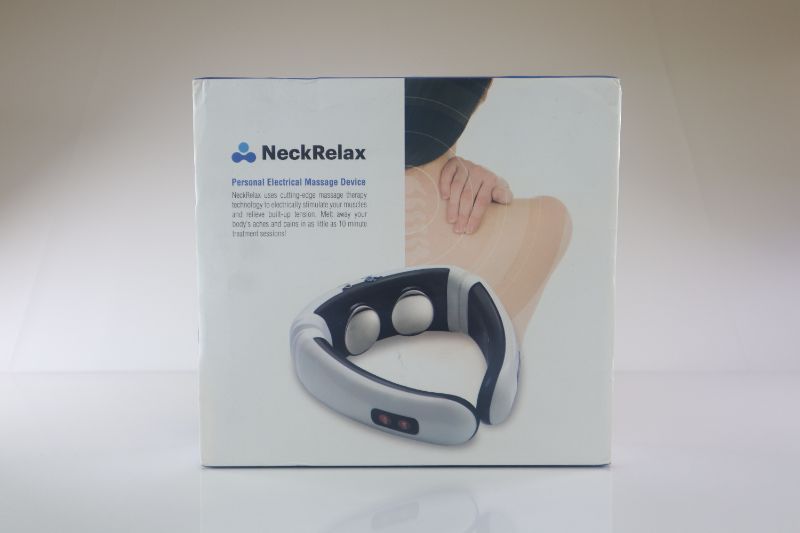 Photo 2 of NECK RELAX RELEASEES TENSION THROUGH NECK BACK AND SHOULDERS 2 ELECTRO PADS 1 ELECTRO CORD 1 NECK RELAX NEW 