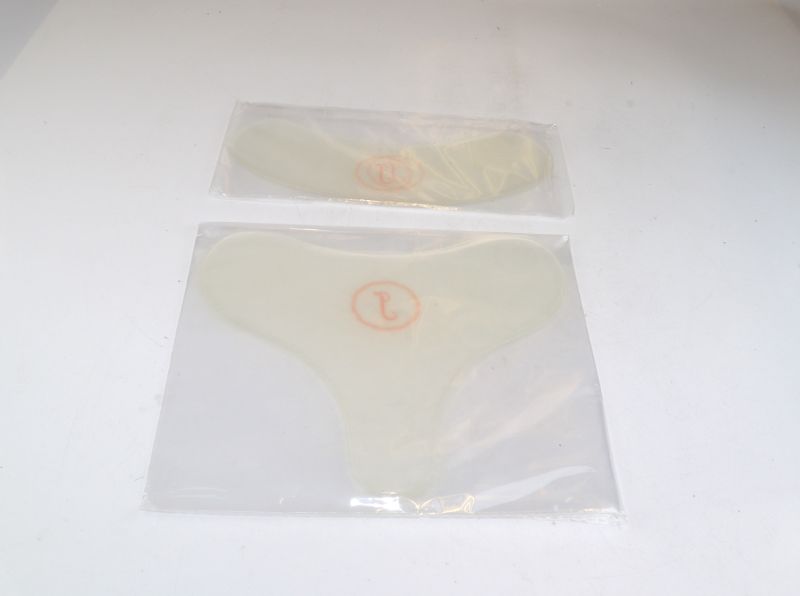 Photo 1 of CHEST AND NECK SMOOTHING PADS STRETCHES SKIN KEEPS IT FIRM IMPROVES IRREGULAR COLLAGEN STRUCTURE INCREASES BLOODFLOW DURABLE AND LONG LASTING SET OF NECK AND CHEST T SHAPE PADS NEW 