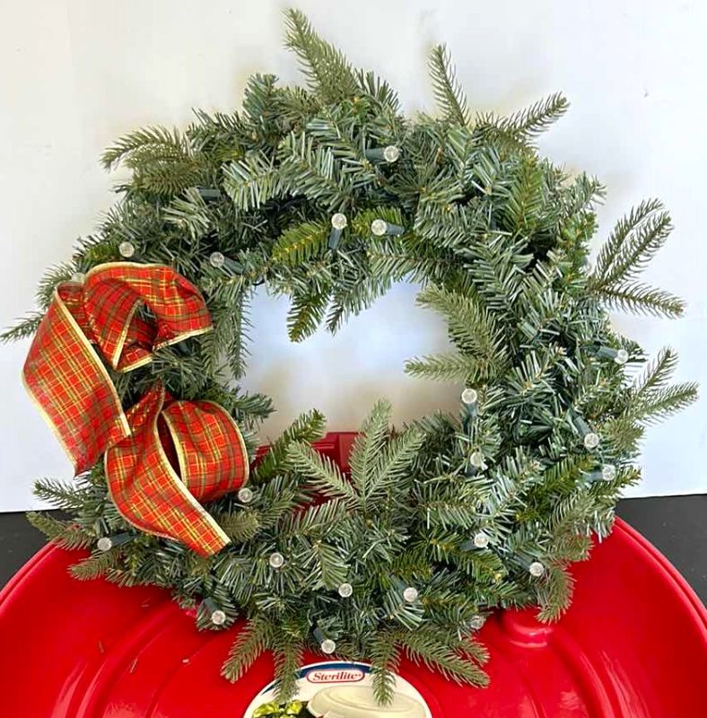 Photo 1 of  CHRISTMAS WREATH IN TOTE 24”