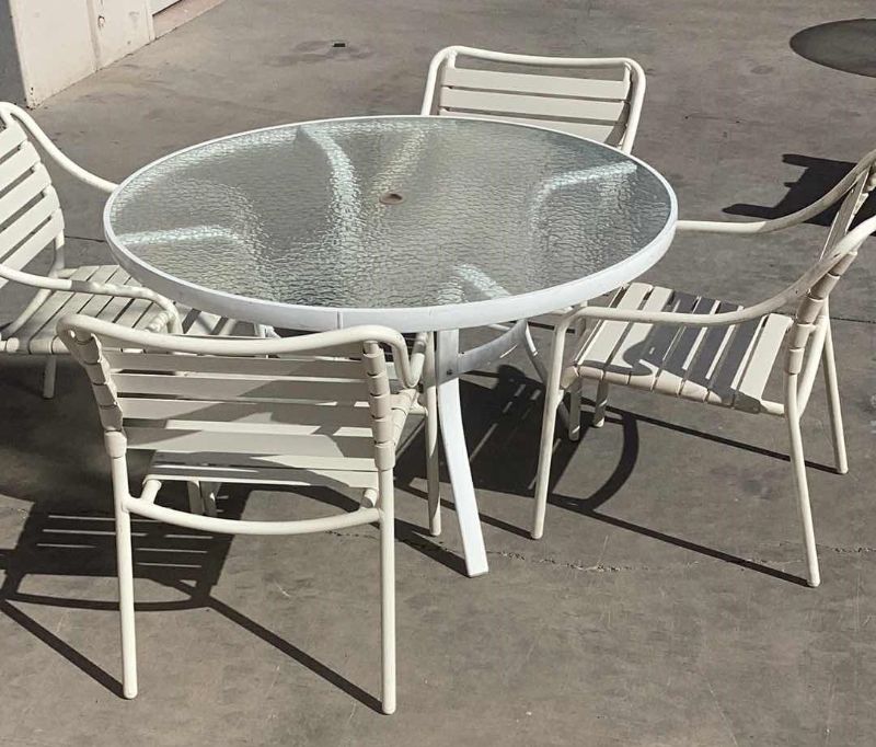 Photo 1 of 48" ROUND WHITE W GLASSTOP PATIO TABLE W. 4 CHAIRS 