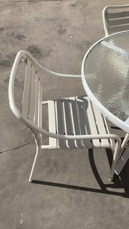 Photo 2 of 48" ROUND WHITE W GLASSTOP PATIO TABLE W. 4 CHAIRS 