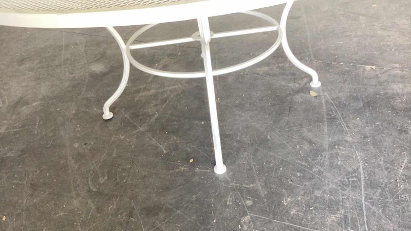 Photo 2 of 60" ROUND WHITE METAL OUTDOOR TABLE