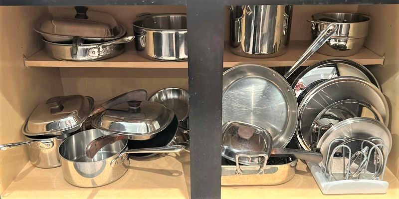 Photo 1 of ENTIRE CABINET OF POTS AND PANS