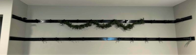 Photo 1 of 2 - WALL GUITAR RACKS 1 x 4 PAINTED BOARDS W GUITAR HOLDERS LENGTH 14’ 11” PLUS 2,SIDE PIECES 30”