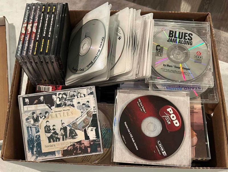 Photo 1 of BOX OF MUSIC CD’S AND VIDEOS