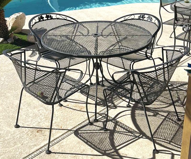 Photo 1 of 42” BLACK WROUGHT IRON TABLE AND 4 CHAIRS