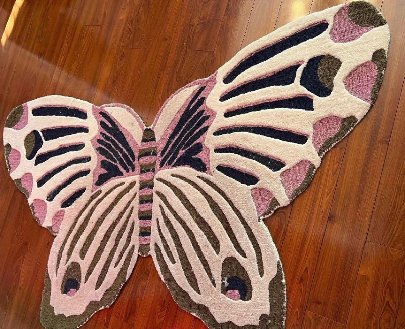 Photo 1 of ANTHROPOLOGY BUTTERFLY RUG. MULTI COLORED WITH PINK AND WHITE ACCENTS. 4’ X 6.5’