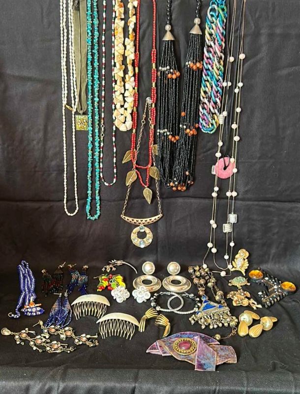 Photo 1 of AN ASSORTMENT OF COSTUME JEWELRY