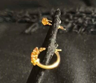 Photo 1 of HOOPED EARRINGS STAMPED “14K” ONE MISSING A STONE