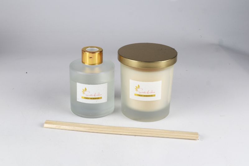 Photo 1 of SCENT OF EDEN CANDLE AND DIFFUSER 1 CANDLE 1 DIFFUSER OIL AND 3 STICKS NEW