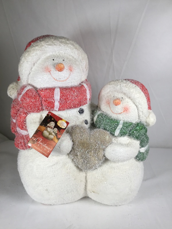 Photo 1 of CHRISMAS SNOW FRIENDS SNOWMEN HOLDING HEART STATUE 13X7X15INCH NEW