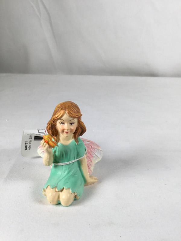 Photo 1 of MINT MINI RESIN SITTING GARDEN FAIRY NEW