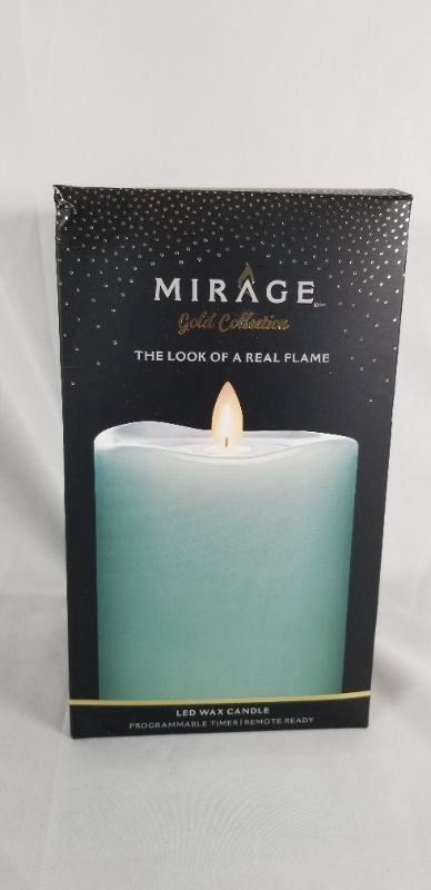 Photo 1 of  TURQUOISE LED WAX FLAMELESS PILLAR CANDLE PROGRAMMABLE TIMER 700 HOURS BATTERY RUN TIME 3.75 X 6 INCHES NEW