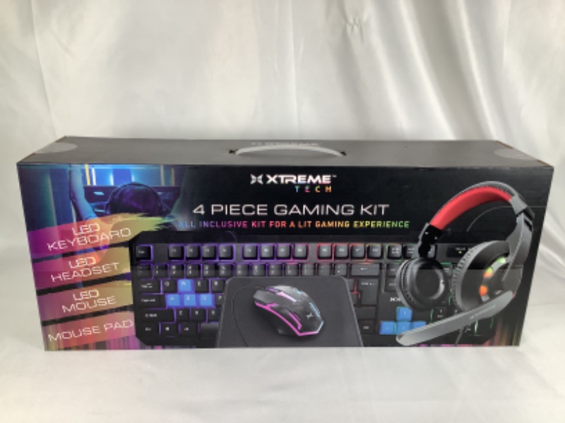 Photo 2 of 4 PIECE GAMING KIT INCLUDES LED KEYBOARD LED HEADSET LED MOUSE AND MOUSEPAD NEW