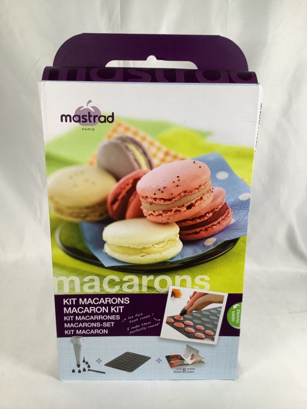 Photo 3 of MACARON KIT INCLUDES A MACARON BAKING SHEET WITH 52 LITTLE CAVITIES ONE 500 ML SILICONE PIPING BAG WITH 6 NOZZLES ONE CAP AND CLIP TO PRESERVE MIXTURES AND A MACARON BOOKLET WITH ADVICE AND RECIPES NEW