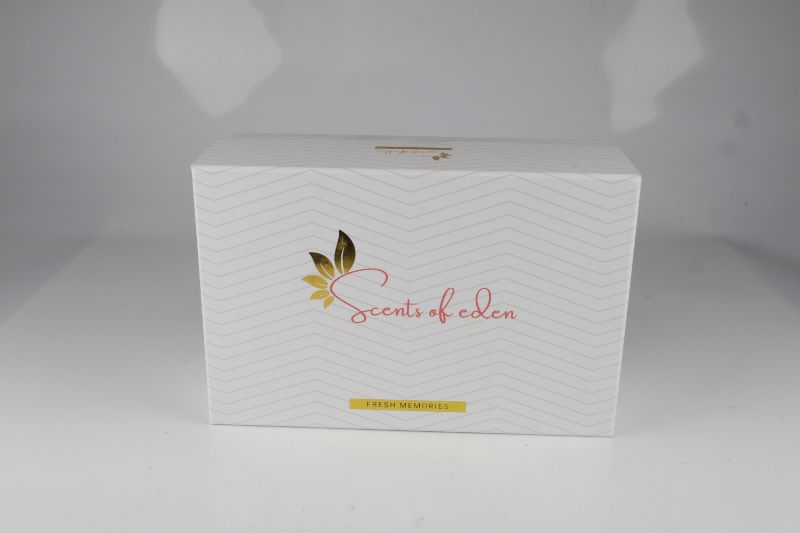 Photo 1 of SCENT OF EDEN CANDLE AND DIFFUSER 1 CANDLE 1 DIFFUSER OIL AND 3 STICKS NEW