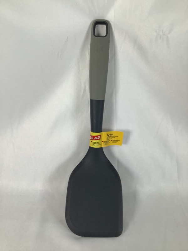 Photo 1 of GRAY KITCHEN TURNER WITH EASY GRIP HANDLE IDEAL FOR NON STICK SURFACES HEAT RESISTANT UP TO 410 DISHWASHER SAFE NEW