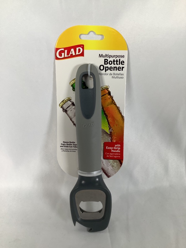 Photo 1 of GRAY MULTIPURPOSE  BOTTLE OPENER WITH EASY GRIP HANDLE OPENS BOTTLE CAPS BOTTLE TOPS AND SODA CAN TABS NEW