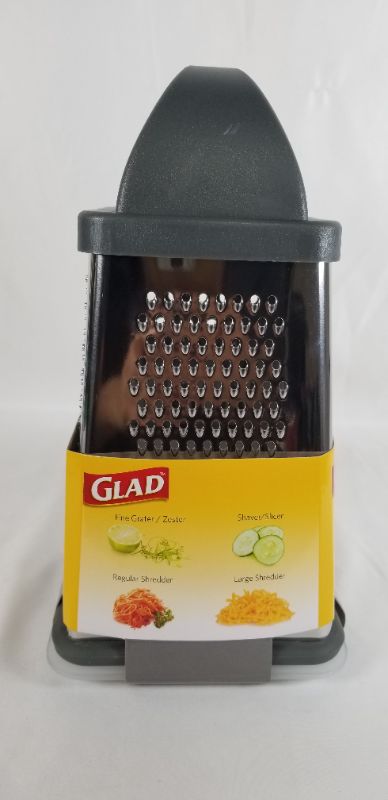 Photo 2 of  4 SIDED GRATER WITH CONTAINER STAIN AND CORROSION  RESISTANT NON SLIP BASE NEW