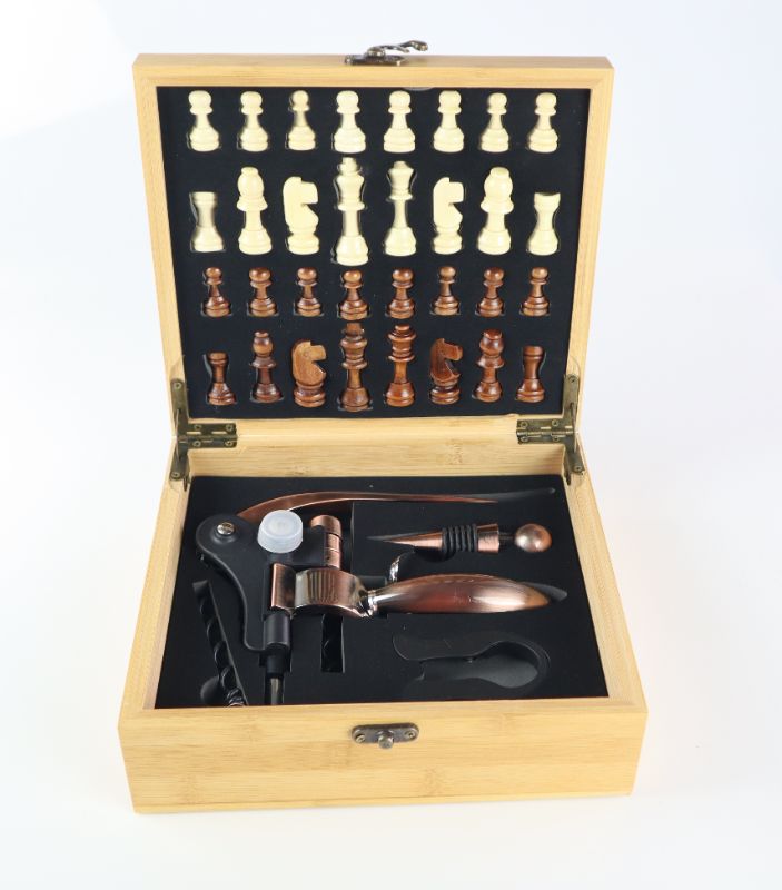 Photo 1 of WINE ACCESSORIES CHESS SET WOODEN CHESS BOX WHITE AND BROWN CHESS PIECES COMPLETE WITH WINE OPENER KORK AND HOLDER NEW IN BOX 