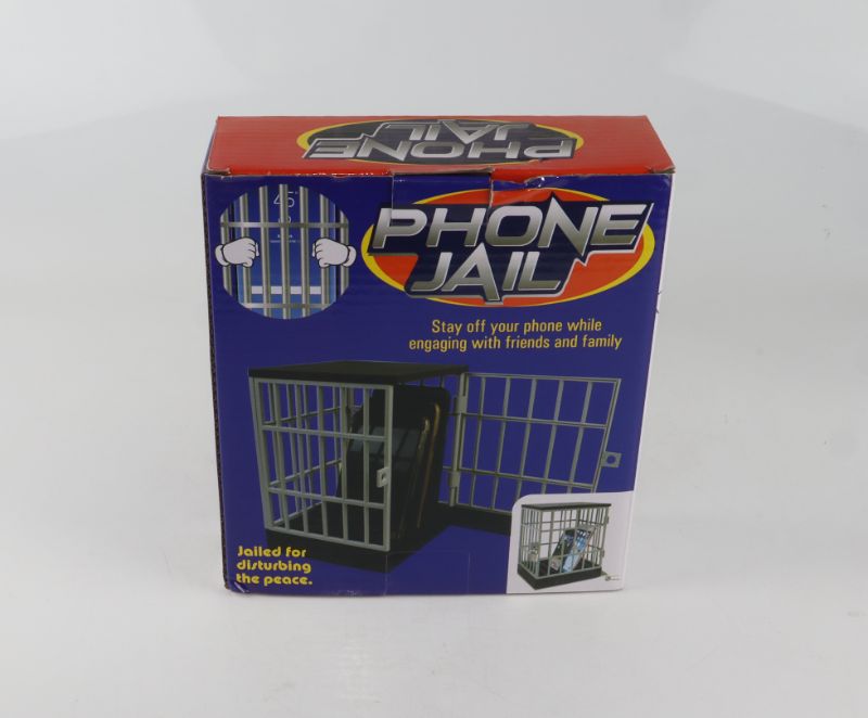 Photo 1 of PLASTIC PHONE JAIL HOLDS UP TO 6 PHONES SIZE 15x13x19 CM NEW 
