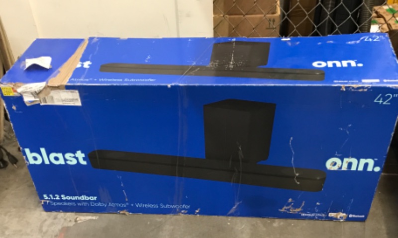 Photo 2 of ONN 5.1.2 SOUNDBAR WITH DOLBY ATMOS AND WIRELESS SUBWOOFER 42” 
RETAIL $324.00