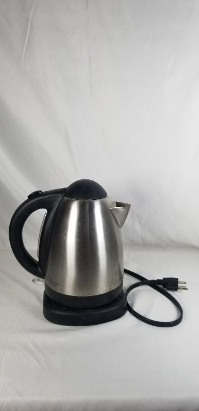 Photo 2 of CORDLESS ELECTRIC KETTLE WITH AUTO SHUT OFF 360 DEGREE SWIVEL BASE CONCEALED HEATER REMOVABLE FILTER 1500 WATT USED 
