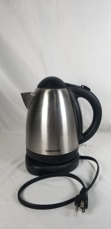 Photo 1 of CORDLESS ELECTRIC KETTLE WITH AUTO SHUT OFF 360 DEGREE SWIVEL BASE CONCEALED HEATER REMOVABLE FILTER 1500 WATT USED 
