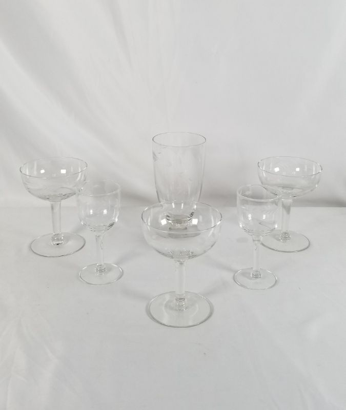 Photo 1 of 6 PIECE CLEAR  WINE/DRINKING GLASSES WITH EMBOSSED LEAF DESIGN 3 DIFFRENT SYTLES USED 
