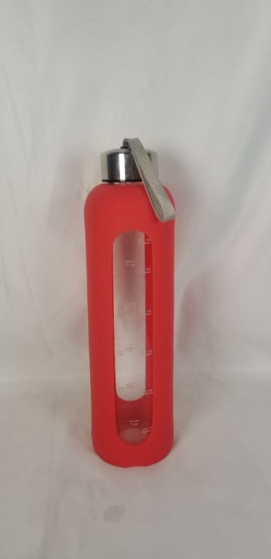 Photo 3 of 32OZ GLASS WATER BOTTLE RED SILICONE COVER METAL CAP WITH HANDLE, WATER BOTTLE HAS TIME MARKINGS ALONG THE SIDE TO REMIND YOU TO DRINK ENOUGH WATER USED 