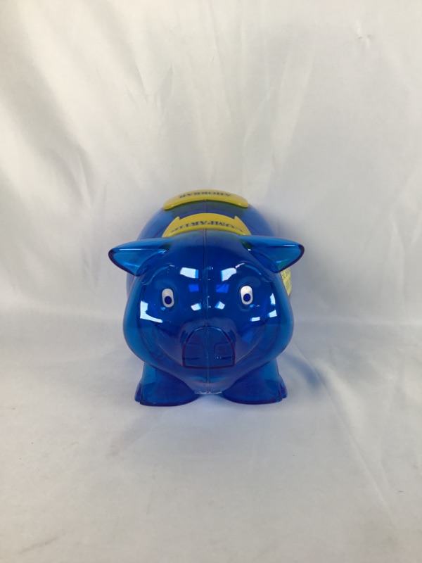 Photo 2 of PLASTIC BLUE PIGGY BANK WITH SPANISH WORDS 5 X 8 X 5.5H INCHES NEW 