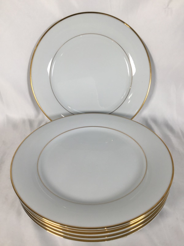 Photo 1 of WHITE 10.5 INCH DINNING PLATE WITH GOLD RIM USED 