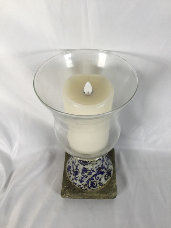 Photo 2 of HOME DECOR FLAMELESS CANDLE IN GLASS VASE WITH  STONE BASE AND BLUE FLORAL DESIGN 11H INCHES USED 