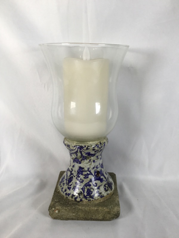 Photo 1 of HOME DECOR FLAMELESS CANDLE IN GLASS VASE WITH  STONE BASE AND BLUE FLORAL DESIGN 11H INCHES USED 