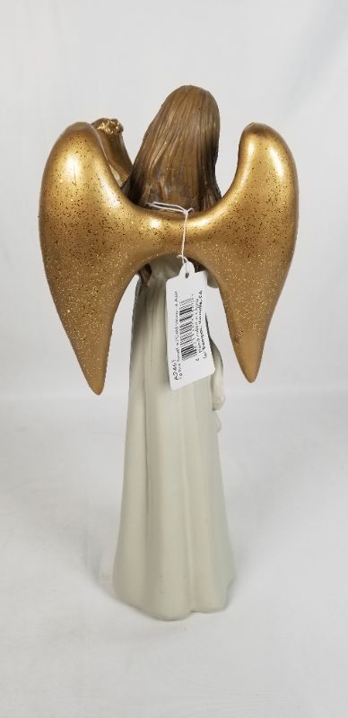 Photo 3 of NEUTRAL TONE DRESS RESIN ANGLE WITH GOLD WINGS PLAYING A GOLD INSTRUMENT 4.5W X 10H INCHES