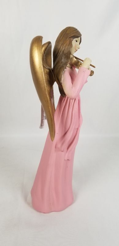 Photo 2 of PINK DRESS RESIN ANGLE WITH GOLD WINGS PLAYING A GOLD INSTRUMENT 4.5W X 10H INCHES