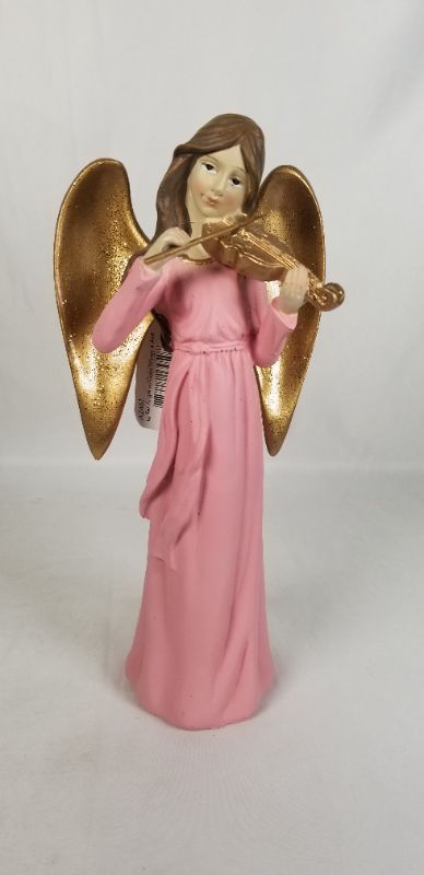 Photo 1 of PINK DRESS RESIN ANGLE WITH GOLD WINGS PLAYING A GOLD INSTRUMENT 4.5W X 10H INCHES