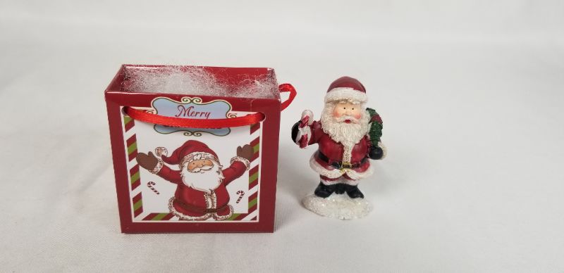 Photo 1 of MINI RESIN SANTA INSIDE A CHRISTMAS GIFT BAG NEW 